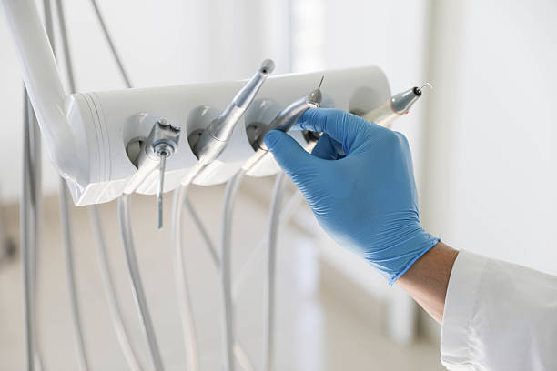 Professional Tooth Extraction technician working in Goldsboro, NC